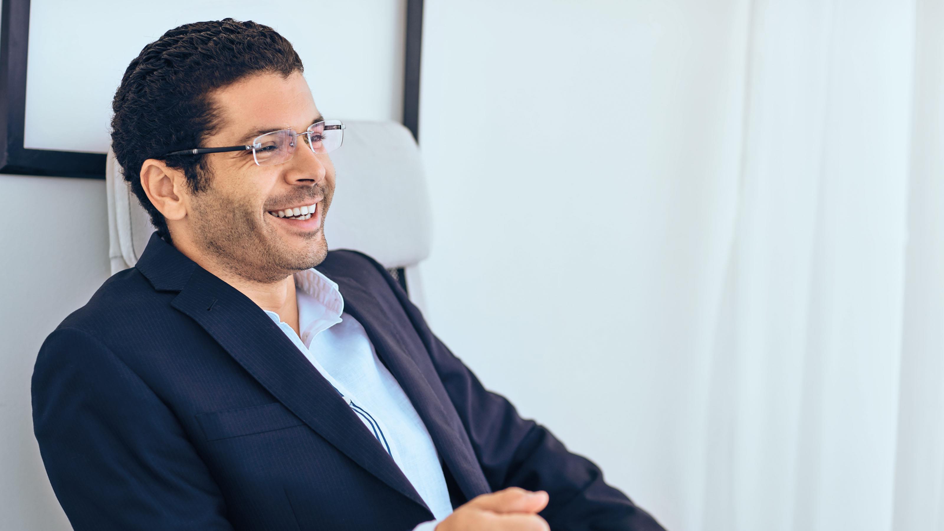 Man in suit smiling